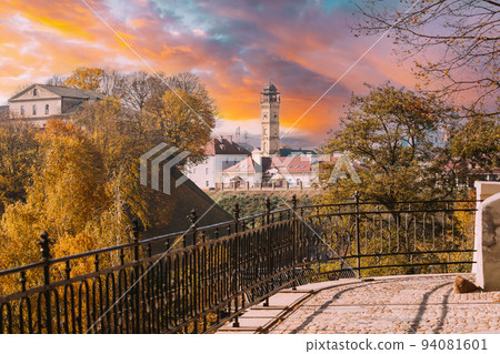 Grodno, Belarus. Scenic View Of Fire Lookout Tower, Fire Watch Tower Or Lookout Tower At Zamkovaya Street In Sunset Or Sunrise Time. Architectural Monument Of 20th Century. Popular Tourist Attraction 94081601