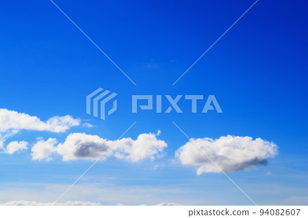 Three cotton clouds floating in the blue sky Three cotton clouds floating in the blue sky 94082607