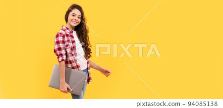 E-learning is a better way of learning. Happy girl child carry laptop. E-learning. Elearning. School girl portrait with laptop, horizontal poster. Banner header with copy space. E-learning is a better way of learning. Happy girl child carry laptop. E-learning. Elearning. School girl portrait with laptop, horizontal poster. Banner header with copy space. 94085138