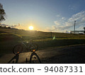 bicycle and sunset 94087331