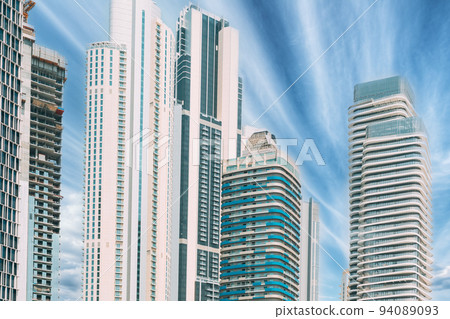 View of high-rise buildings in sunny day. Cityscape Backgrounds View of high-rise buildings in sunny day. Cityscape Backgrounds 94089093