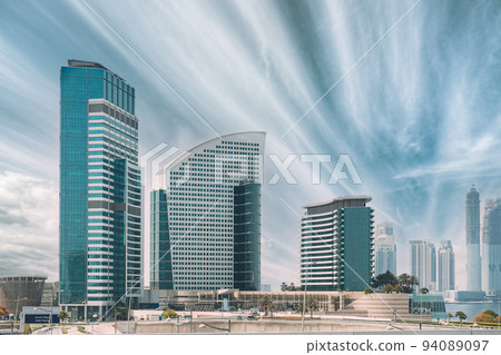 View of high-rise buildings of residential district in Dubai Marina in sunny day. Urban background View of high-rise buildings of residential district in Dubai Marina in sunny day. Urban background 94089097