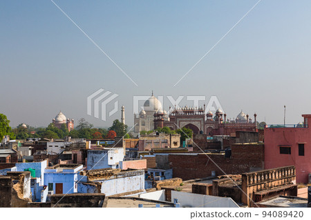 The streets of Agra, India, and the Taj Mahal in the distance. 94089420