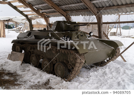 Russia. Saint-Petersburg. Krasnoselsky district. December 12, 2021. Light Soviet T-60 tank in the family historical tank park Steel landing. Russia. Saint-Petersburg. Krasnoselsky district. December 12, 2021. Light Soviet T-60 tank in the family historical tank park Steel landing. 94089705