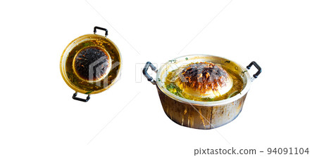 Isolated dirty Korean Barbecue in Thai Style pan with black grill stains on it after using Isolated dirty Korean Barbecue in Thai Style pan with black grill stains on it after using 94091104