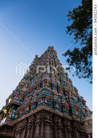 India Pagoda of Meenakshi Temple in the city of Madurai at dusk India Pagoda of Meenakshi Temple in the city of Madurai at dusk 94092243