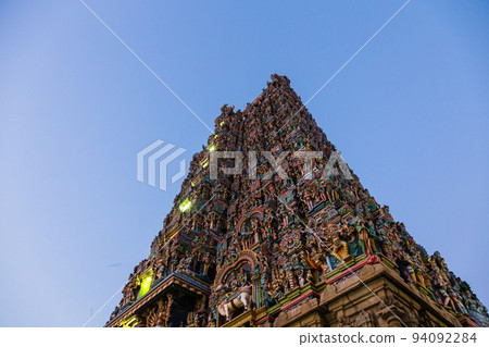 India Pagoda of Meenakshi Temple in the city of Madurai at dusk India Pagoda of Meenakshi Temple in the city of Madurai at dusk 94092284