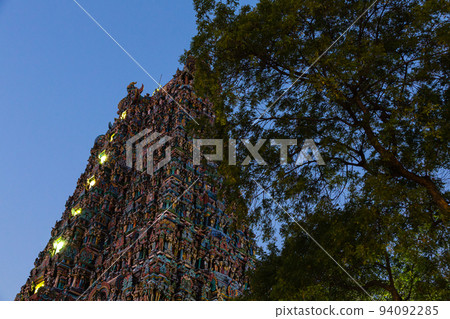India Pagoda of Meenakshi Temple in the city of Madurai at dusk India Pagoda of Meenakshi Temple in the city of Madurai at dusk 94092285