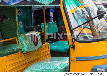 Auto rickshaw, a three-wheeled taxi in the city of Puri, India 94092380