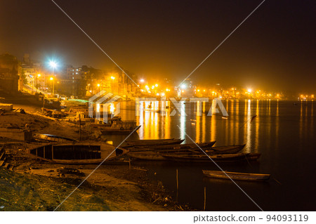 Night view along the holy Ganges river in Varanasi, India Night view along the holy Ganges river in Varanasi, India 94093119