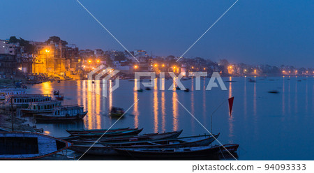 Night view along the holy Ganges river in Varanasi, India Night view along the holy Ganges river in Varanasi, India 94093333