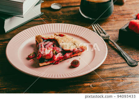 Slice of Fresh Baked Strawberry Sorrel Galette 94093433