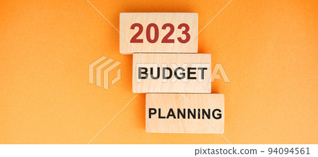 Wooden blocks 2023, budget, planning. Financial management in company. Setting goal, target. Plans and tasks. Business and finance concept 94094561
