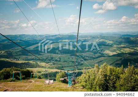 Chairlift in the Carpathian Mountains Chairlift in the Carpathian Mountains 94094662