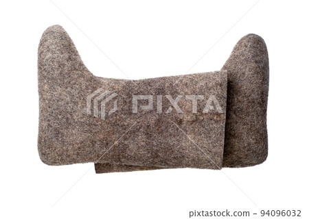 Pair of felt boots winter shoes isolated on white background. 94096032
