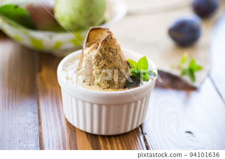 pear baked in curd dough in a small ceramic form pear baked in curd dough in a small ceramic form 94101636