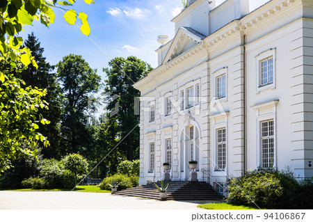 Uzutrakis manor. Colonnaded mansion set in landscaped gardens. Trakai, Lithuania, 2 July 2022 Uzutrakis manor. Colonnaded mansion set in landscaped gardens. Trakai, Lithuania, 2 July 2022 94106867