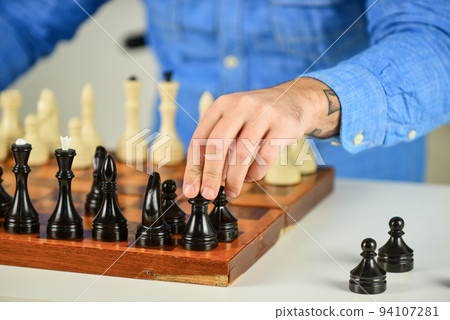 Tactics is knowing what to do. Chess lesson. Strategy concept. Playing chess. Intellectual hobby. Figures on wooden chess board. Thinking about next step. Development logics. Learning play chess 94107281