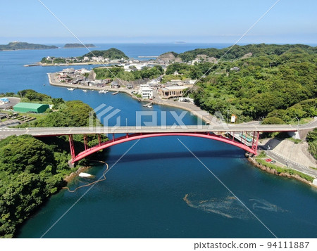 Aerial view of Sakito Bridge connecting Ebiura Island and Sakito Island Aerial view of Sakito Bridge connecting Ebiura Island and Sakito Island 94111887