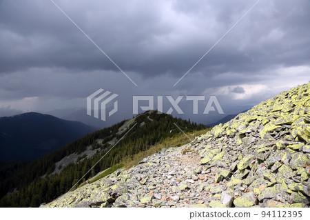 storm clouds in the mountains. storm clouds in the mountains. 94112395