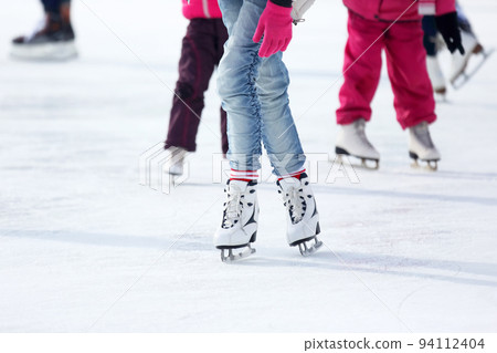 feet skating on the ice rink. feet skating on the ice rink. 94112404