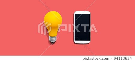 Smartphone with a yellow light bulb 94113634