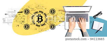 Bitcoin theme with person using a laptop 94113665