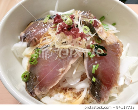 Seared bonito rice bowl served in a white bowl Photo material 94117732