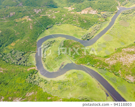 Canyon of Rijeka Crnojevica river near the Skadar lake coast. One of the most famous views of Montenegro. River makes a turn between the mountains and flows backward Portrait of a disgruntled girl 94118803