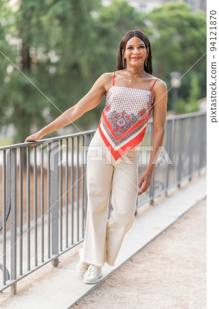 Trans woman posing smiling at the camera Trans woman posing smiling at the camera 94121870