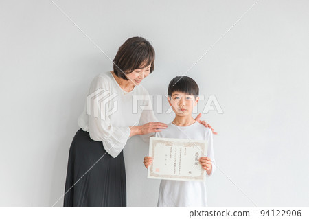 Children and women with letters of appreciation (teacher/mama) Children and women with letters of appreciation (teacher/mama) 94122906