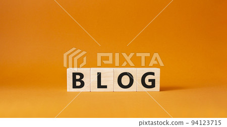 Blog symbol. Concept word Blog on wooden cubes. Beautiful orange background. Business and Blog concept. Copy space. 94123715