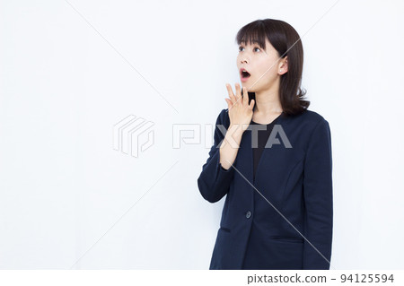 A surprised business woman in her thirties A surprised business woman in her thirties 94125594