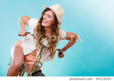 Active woman riding bike bicycle. Recreation. Active woman riding bike bicycle. Recreation. 94128303