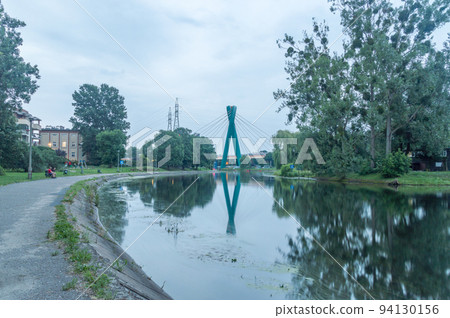 Brda River with University Bridge in the city of Bydgoszcz, Poland. 94130156