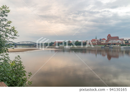 Morning view on vistula river in Torun, Poland. 94130165