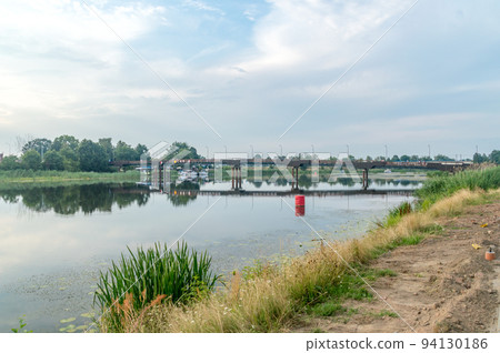 Pedestrian and bicycle bridge over Nogat river in Malbork. Pedestrian and bicycle bridge over Nogat river in Malbork. 94130186