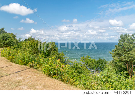 Baltic sea view at sunny day. View from cliff. 94130291