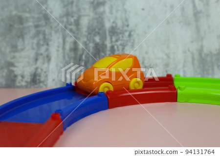 Multi-colored plastic constructor track with cars for children Multi-colored plastic constructor track with cars for children 94131764