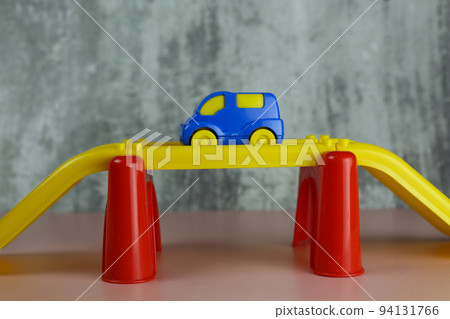 Multi-colored plastic constructor track with cars for children Multi-colored plastic constructor track with cars for children 94131766