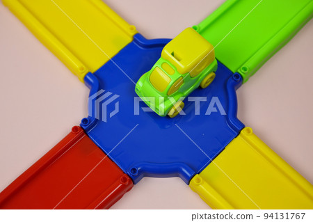 Multi-colored plastic constructor track with cars for children Multi-colored plastic constructor track with cars for children 94131767