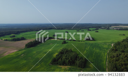 Aerial view of green summer forest and roads. Rural landscape. 94132883