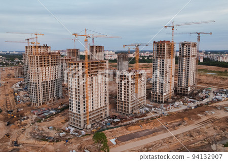 Building construction site. City development. Aerial view from drone Building construction site. City development. Aerial view from drone 94132907