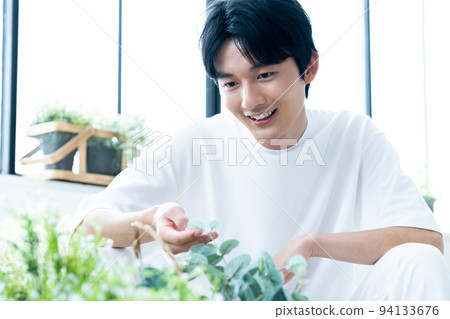 A man who loves foliage plants A man who loves foliage plants 94133676