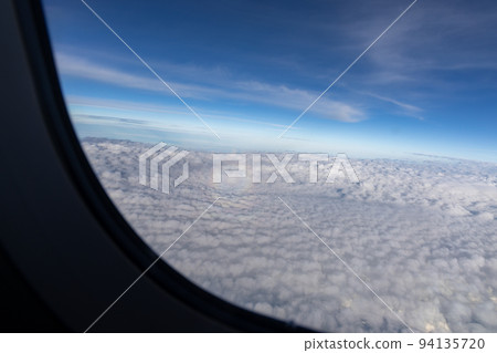 Scenery from the window of the airplane Scenery from the window of the airplane 94135720
