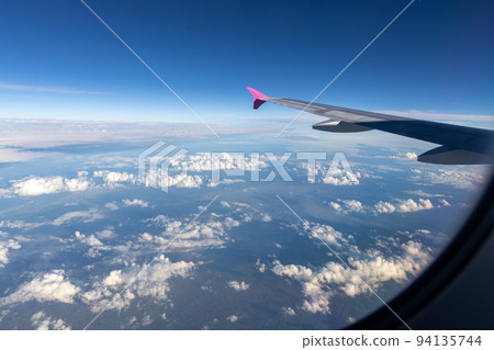 Scenery from the window of the airplane 94135744