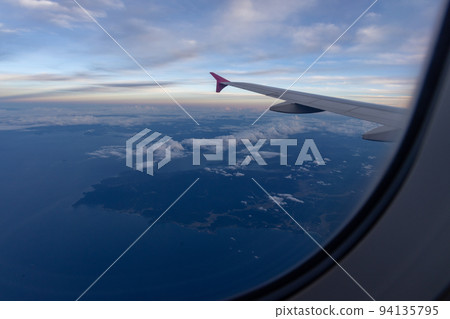 Scenery from the window of the airplane Scenery from the window of the airplane 94135795