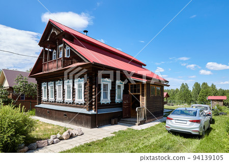 Rural wooden house in the village at summer sunny day Rural wooden house in the village at summer sunny day 94139105