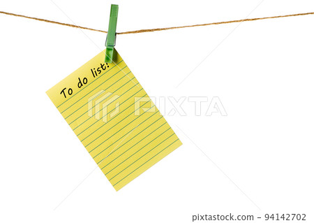 New Year New Goals. Yellow Sticky Note Paper on a clothesline isolated on white. To do list 94142702