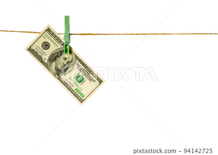 Money laundering. Dollar banknotes hanging on clothesline isolated on white background Money laundering. Dollar banknotes hanging on clothesline isolated on white background 94142725